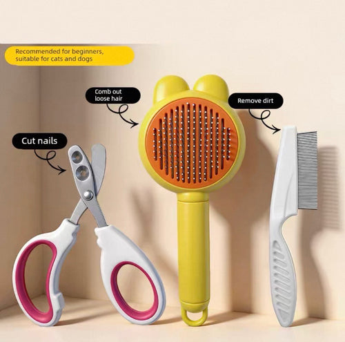 Pet grooming tools including a brush, scissors, and comb on a beige background.